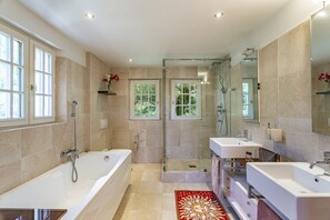 Bathtub, hair dryer, towels