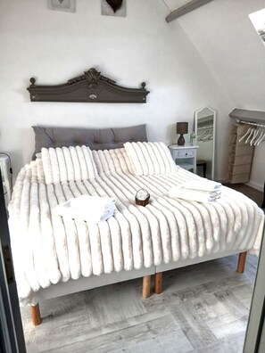 1 室のベッドルーム、旅行用ベビーベッド、WiFi (無料)、ベッドシーツ