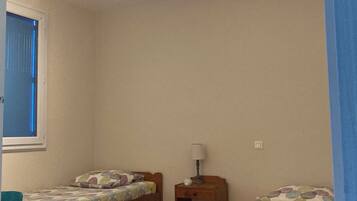 4 chambres, chambres insonorisées, fer et planche à repasser