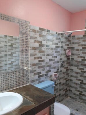 Shower, hair dryer, towels, soap