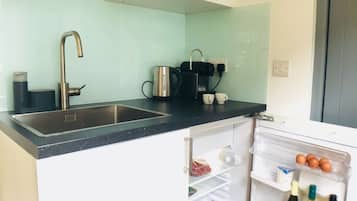 Fridge, microwave, coffee/tea maker, electric kettle