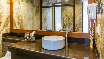 Shower, hair dryer, towels, toilet paper
