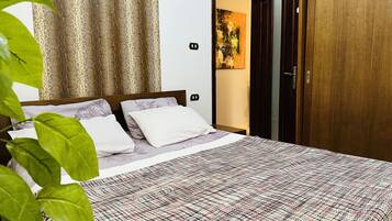 1 chambre, fer et planche Ă repasser, Wi-Fi, draps fournis