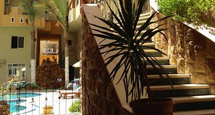 Diamond Arabia. Vue sur la piscine. Lieu de vacances parfait pour vous et votre famille