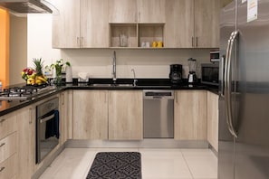 Fridge, microwave, oven, stovetop - Nayri Life & Spa 1034 Apt one block on the beach in Romantic Zone PV (Emiliano Zapata)