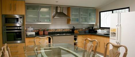 Microwave, coffee/tea maker, cookware/dishes/utensils