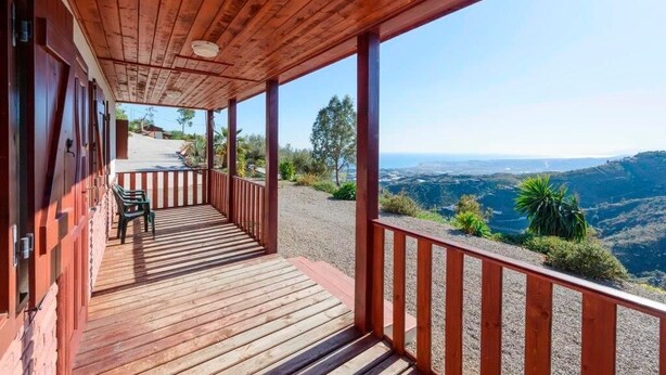 A wooden deck with a view of a valley. - House with Private Pool (Piscis) (Arenas)