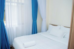 1 habitación, tabla de planchar con plancha, wifi gratis y ropa de cama 