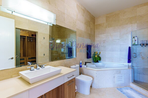 Bathtub, hair dryer, towels