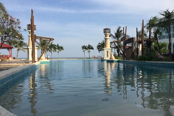 Nice swimming pool next from the beach