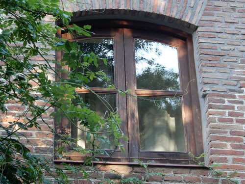 Farm of 3 has fenced, with two-story house and stables with dressage track