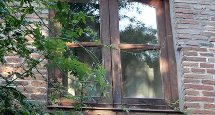 Farm of 3 has fenced, with two-story house and stables with dressage track