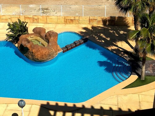 Apartment with pool near the center and the beach