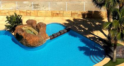 Apartment with pool near the center and the beach