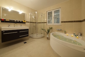 Shower, jetted tub, hair dryer, bidet