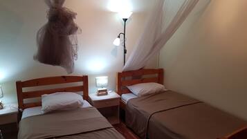 2 habitaciones, tabla de planchar con plancha, wifi y ropa de cama
