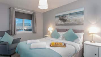 1 bedroom, premium bedding, iron/ironing board, travel crib