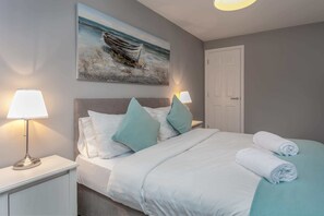 1 dormitorio y ropa de cama de alta calidad