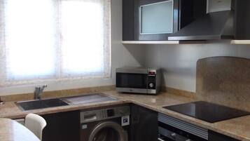 Rentaplats i utensilis de cuina, vaixella i coberteria