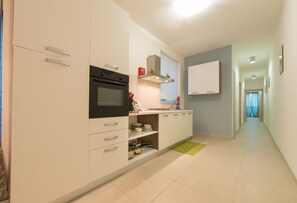 Fridge, microwave, cookware/dishes/utensils, freezer