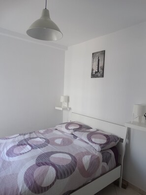 2 dormitorios, tabla de planchar con plancha, wifi gratis y ropa de cama
