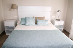 3 habitaciones, tabla de planchar con plancha, wifi y ropa de cama 