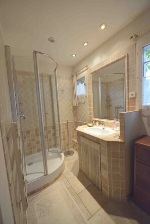 Shower, hair dryer, towels, soap
