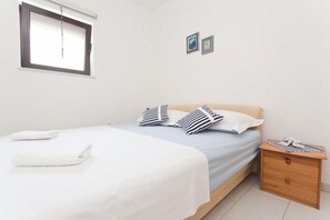 Apartment, 3 Bedrooms, Sea View | Iron/ironing board, free cots/infant beds, rollaway beds, free WiFi