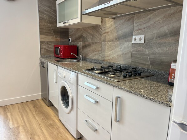 Fridge, microwave, coffee/tea maker, toaster