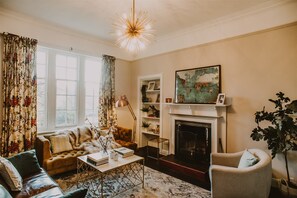 Smart TV, fireplace, books