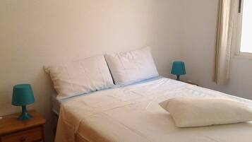 2 dormitorios, caja fuerte, tabla de planchar con plancha y wifi gratis