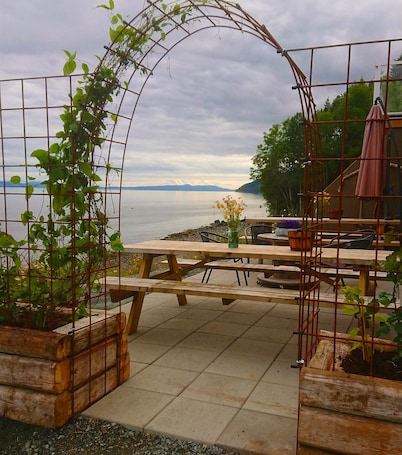 Outdoor dining. Hjellup Fjordbo, house 1 - Fantastic fjord view!