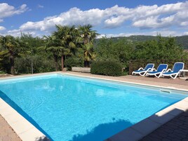 Outdoor pool, pool umbrellas, sun loungers