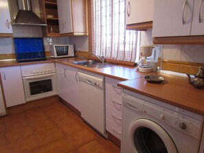 Fridge, microwave, oven, stovetop - Apartment rental, golf and beach // golf and beach Apartment (torre de benagalbon)