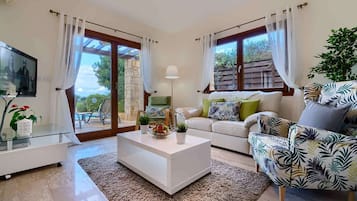 Villa, 2 Bedrooms | Living area | Flat-screen TV, DVD player