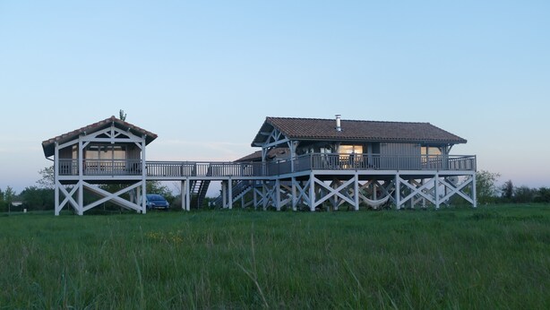 A two-story house with a balcony and a separate garage. - House / Villa - Talais (Talais)