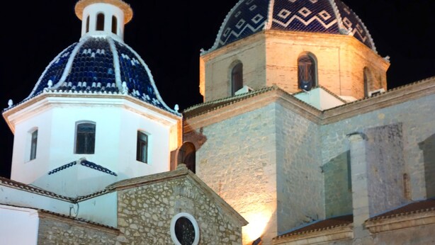 A stone building with a dome and a smaller adjacent structure. There are outdoor tables and chairs under a canopy. - Near sea and quiet, beautiful view   (Altea)