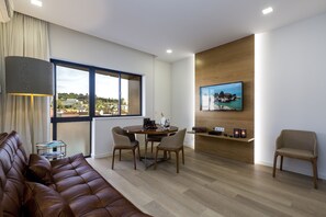 Flat-screen TV, books, offices