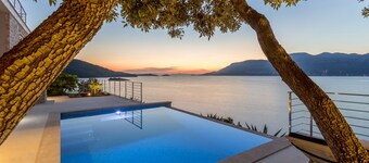 Beachfront Villa Poseidon with Heated Pool