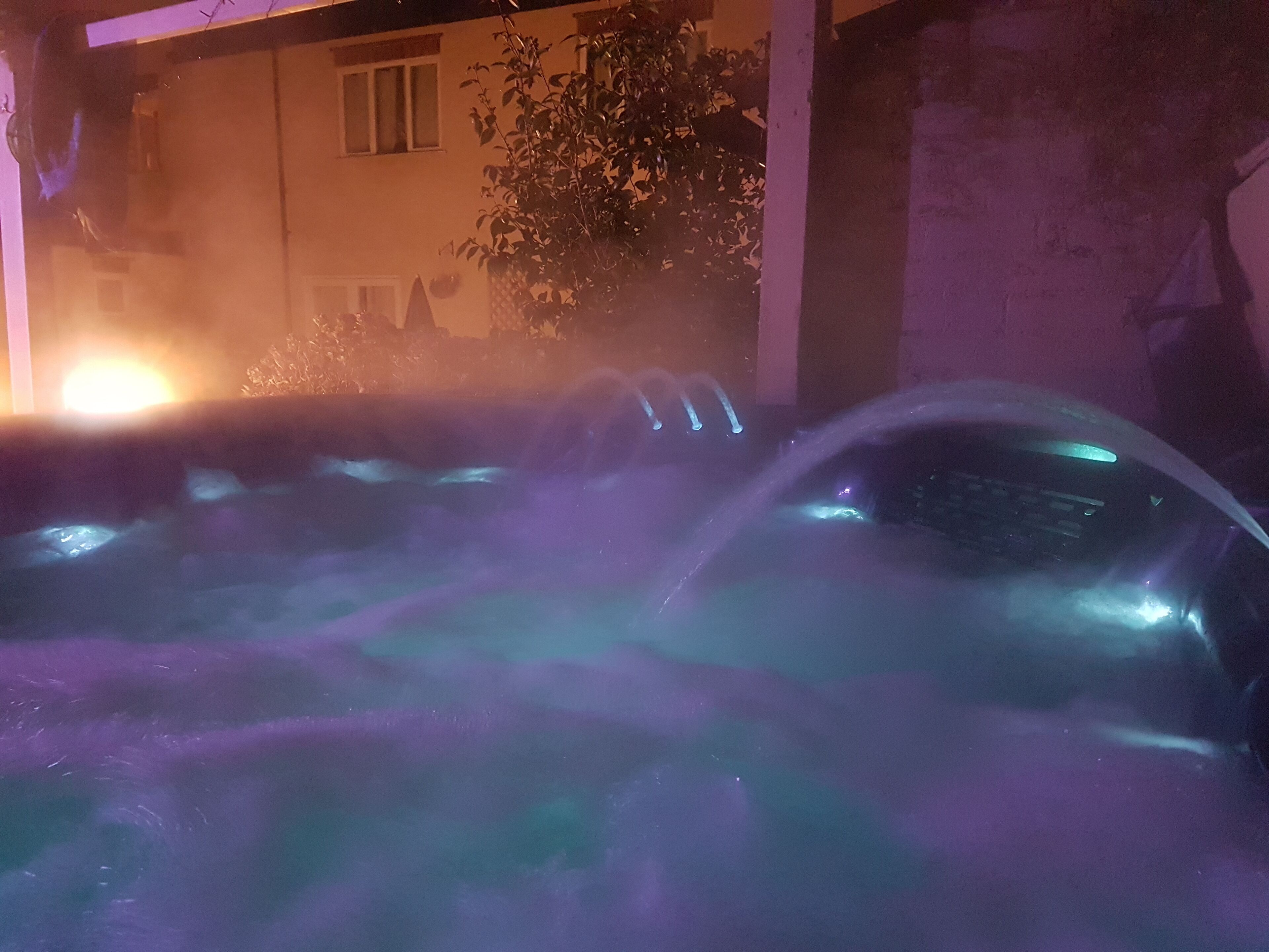 Hot tub with color changing light system.