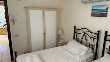 2 habitaciones, tabla de planchar con plancha y wifi gratis