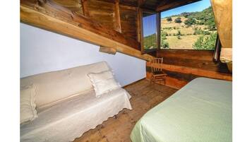 2 dormitoris, un bressol de viatge, wifi i roba de llit