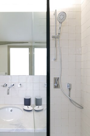 Shower, hair dryer, towels, soap