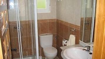 Bathtub, hair dryer, towels, soap