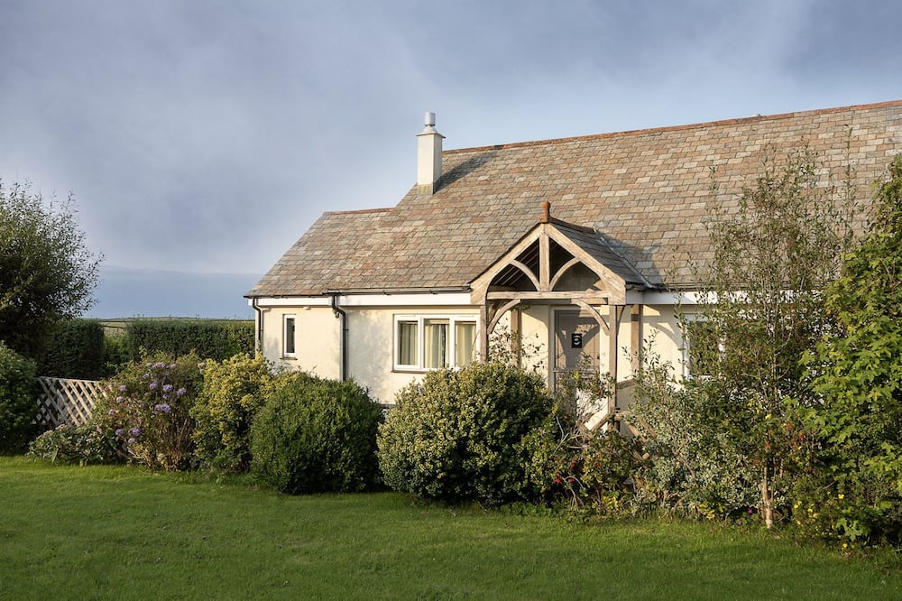 Charming characterful cottage overlooking Cornish countryside with sea view.