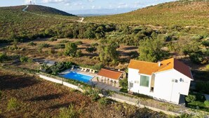 A white house with a red roof, a swimming pool, and a garden. - Villa Green Oasis by AdriaticLuxuryVillas (Debeljak)