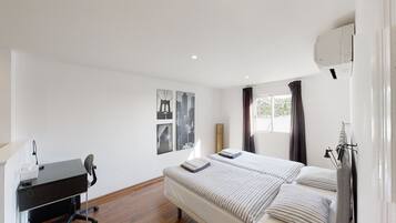 5 slaapkamers, een strijkplank/strijkijzer, reisbedje, gratis wifi
