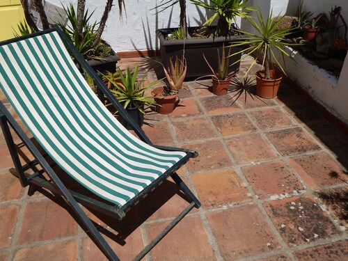 Spacious and charming with outside terrace. Very central. Free parking nearby.