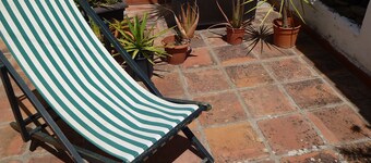 Spacious and charming with outside terrace. Very central. Free parking nearby.