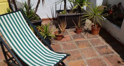 Spacious and charming with outside terrace. Very central. Free parking nearby.